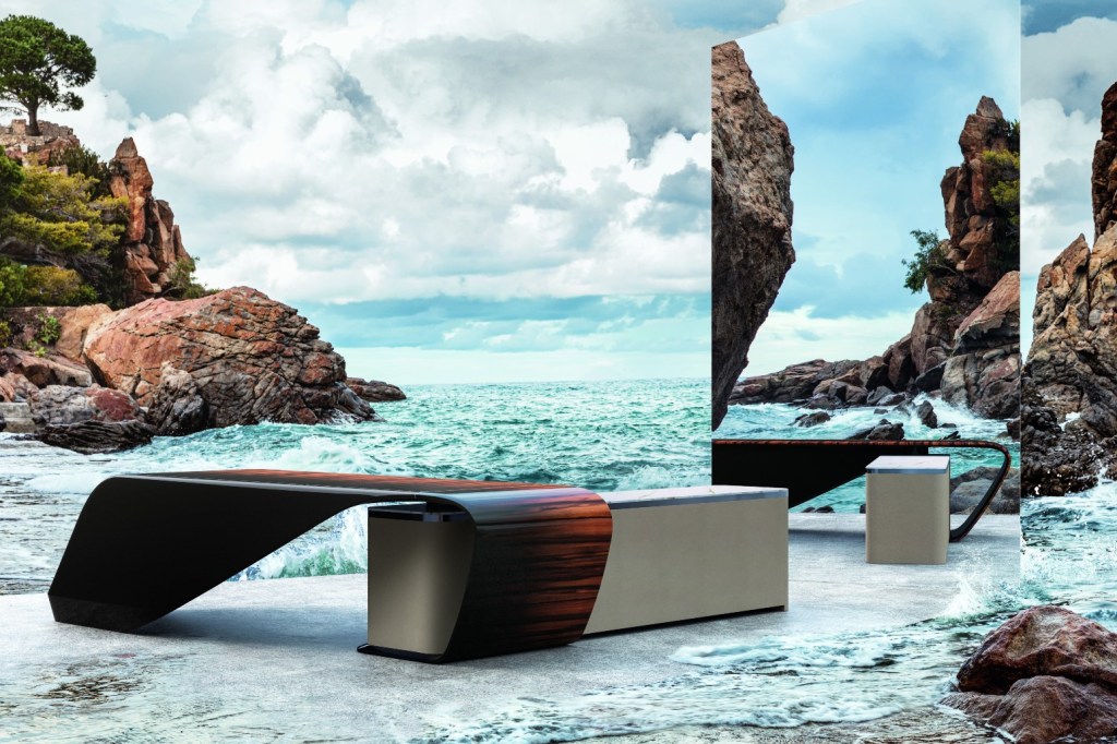 Bentley Collection 2021 Styal Desk posed in front of a dramatic seascape