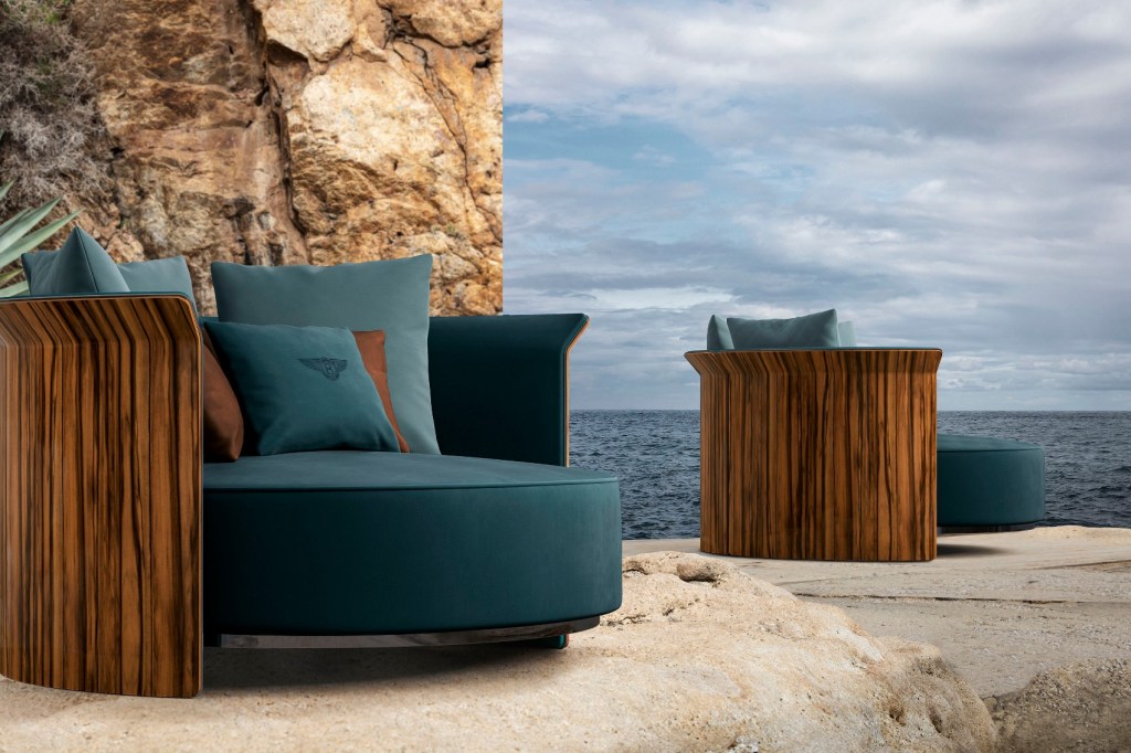 Bentley Home Collection Ramsey loveseat posed on a rocky outcrop