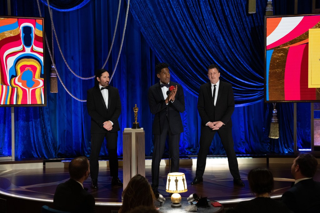Trent Reznor, Jon Batiste and Atticus Ross accept the Oscar for their Soul score