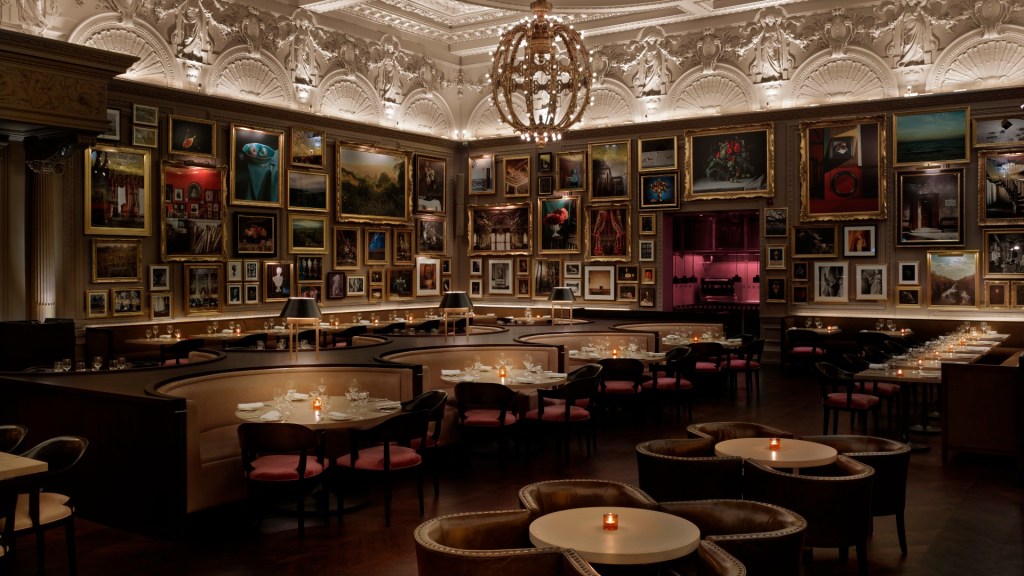 Empty table inside Berners Tavern at The London EDITION hotel
