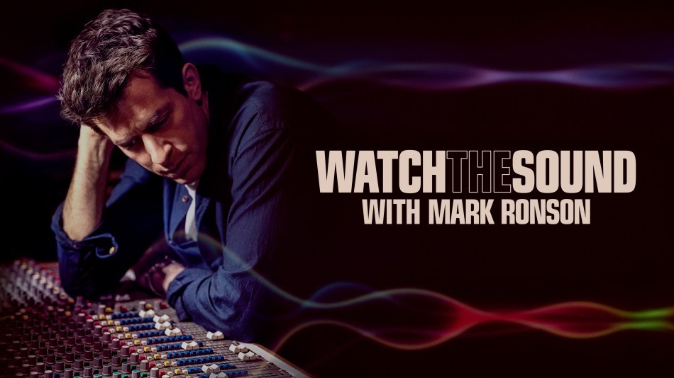 Mark Ronson stares at a mixing desk in a recording studio