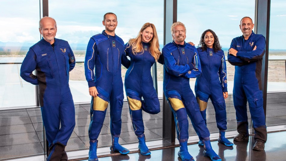 The Virgin GalacticUnity22 Crew with Richard Branson in their blue space suits