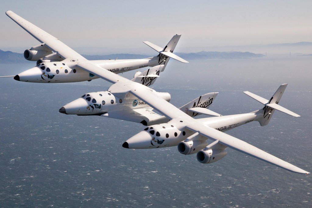 Virgin Galactic VMS Eve and SpaceShipTwo fly over the San Francisco Bay