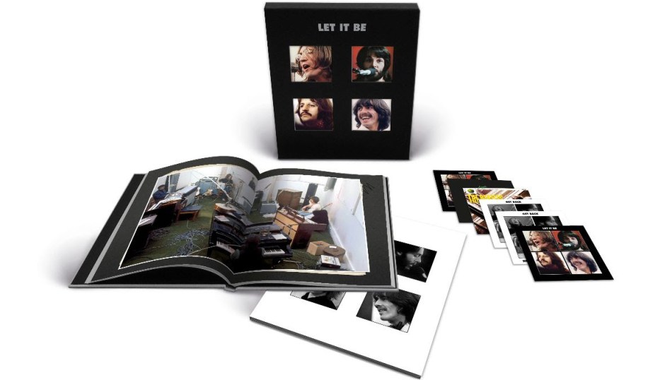 The Beatles Let it Be Super Deluxe collection pack opened up to show book and discs
