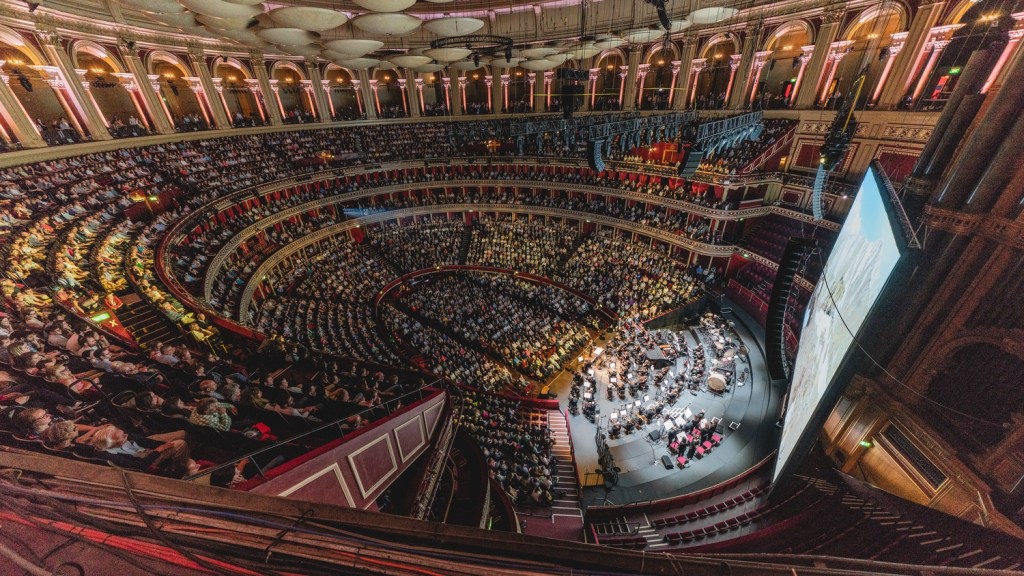 A stunning view of the Royal Albert Hall auditorium with ginat cinema screen
