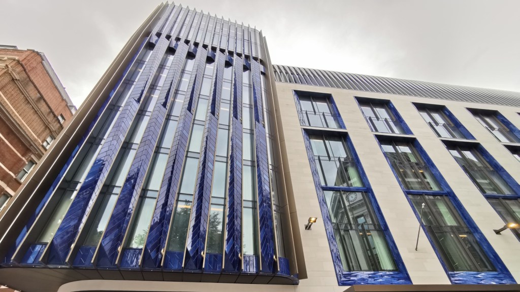 The striking gloss blue exterior of The Londoner hotel