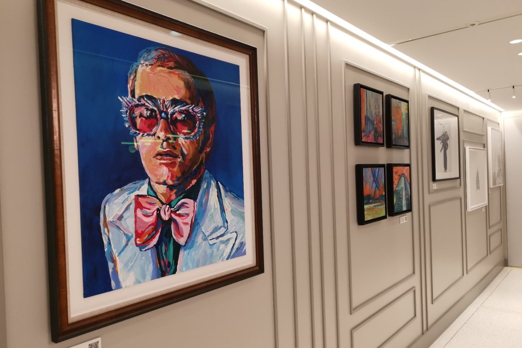 The Ammex Centurion art gallery with a large painting of Elton John at LHR