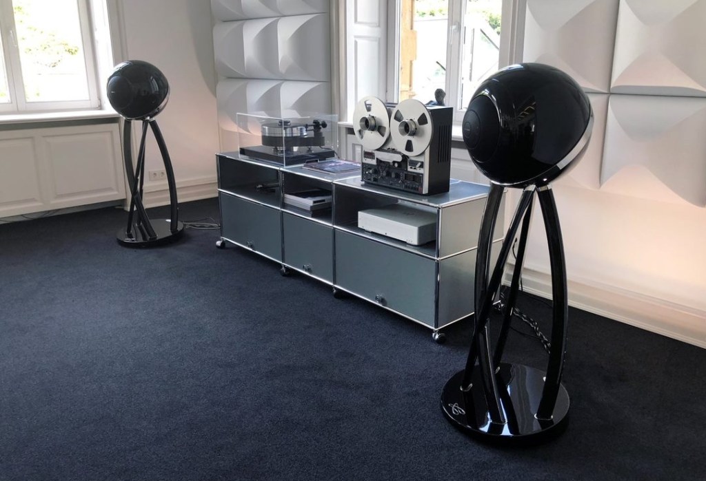 Cabasse Pearl Pelegrina speakers alongside a high end record deck and tape machine