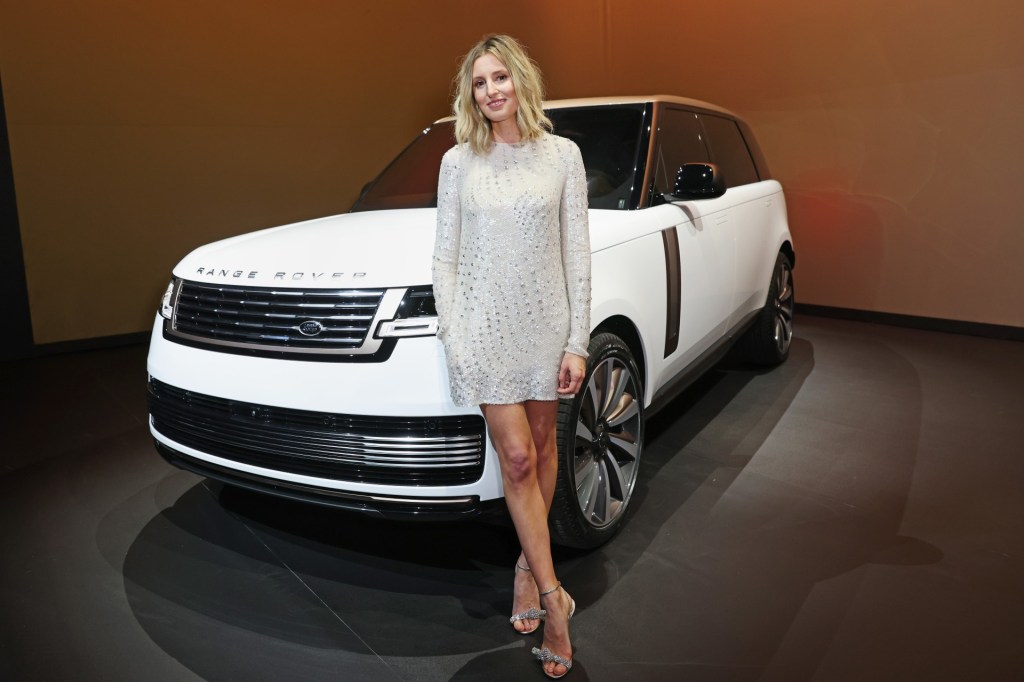 Actor Laura Carmichael in front of a Range Rover SV