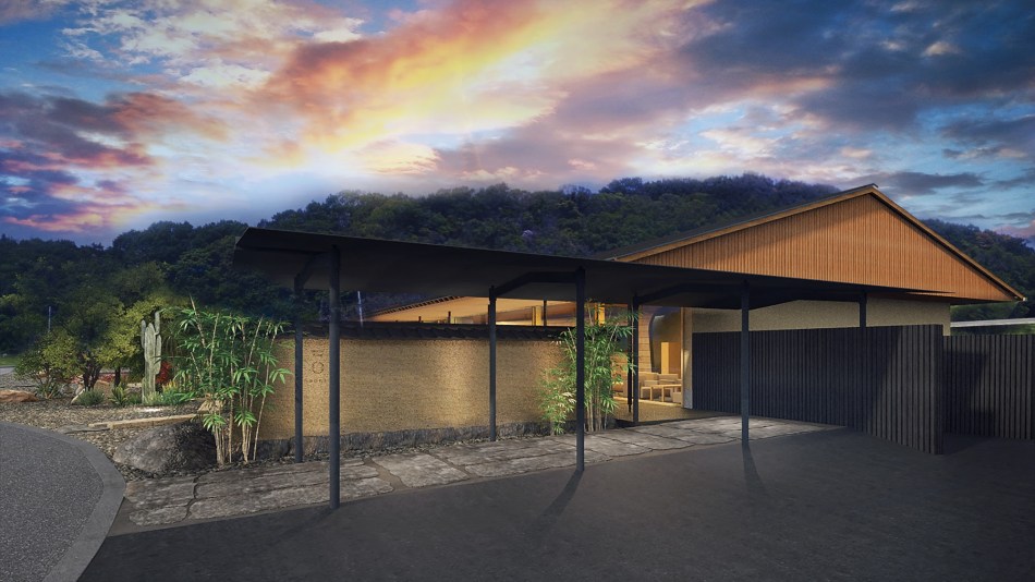 An exterior sunset view of the Roka Ryokan hotel on Naoshima