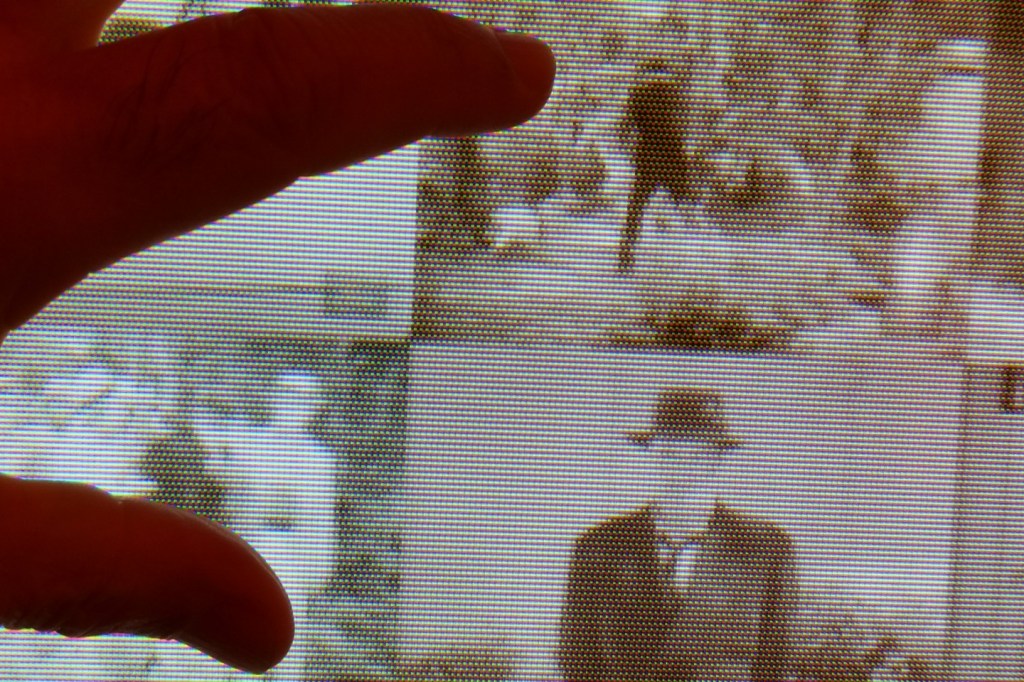 Zoom into digital frame reveals images from movie