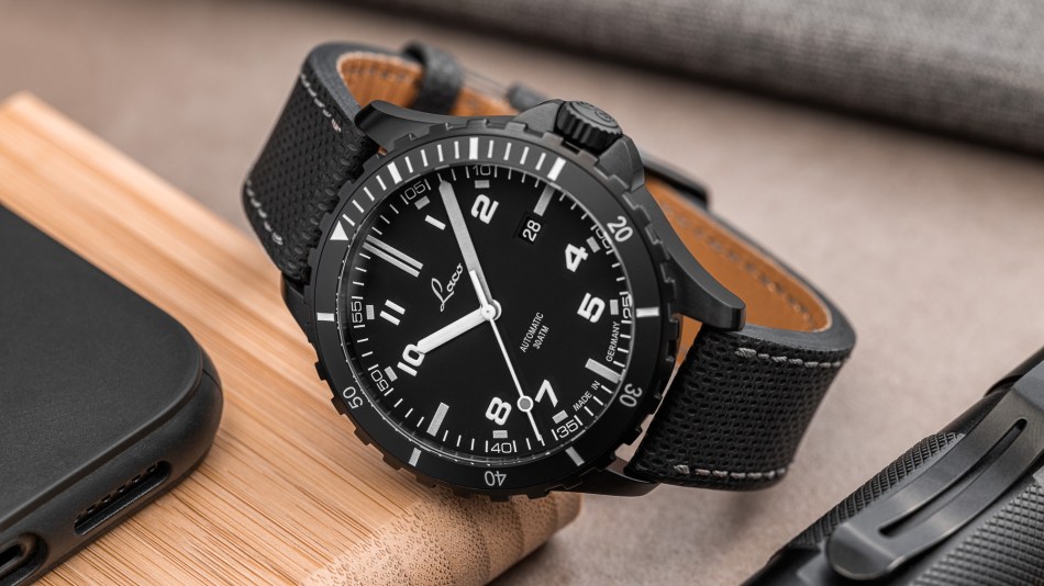 Laco Edition 96 all-black watch on a desk