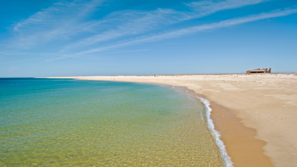 The Algarve Jamanta beach under blue skies