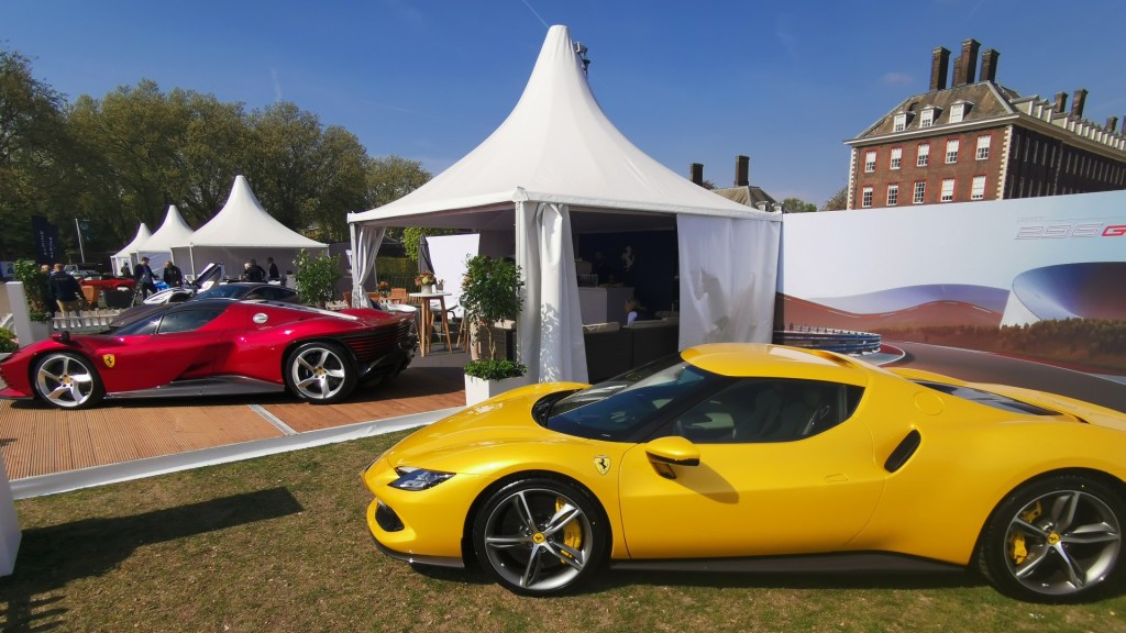 Ferrari Daytona SP3 and bright yellow Ferrari 296 GTB with Royal Hospital Chelsea in the background