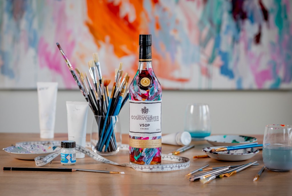 Courvoisier cognac bottle painted in bright colours by  Daniel w. Fletcher