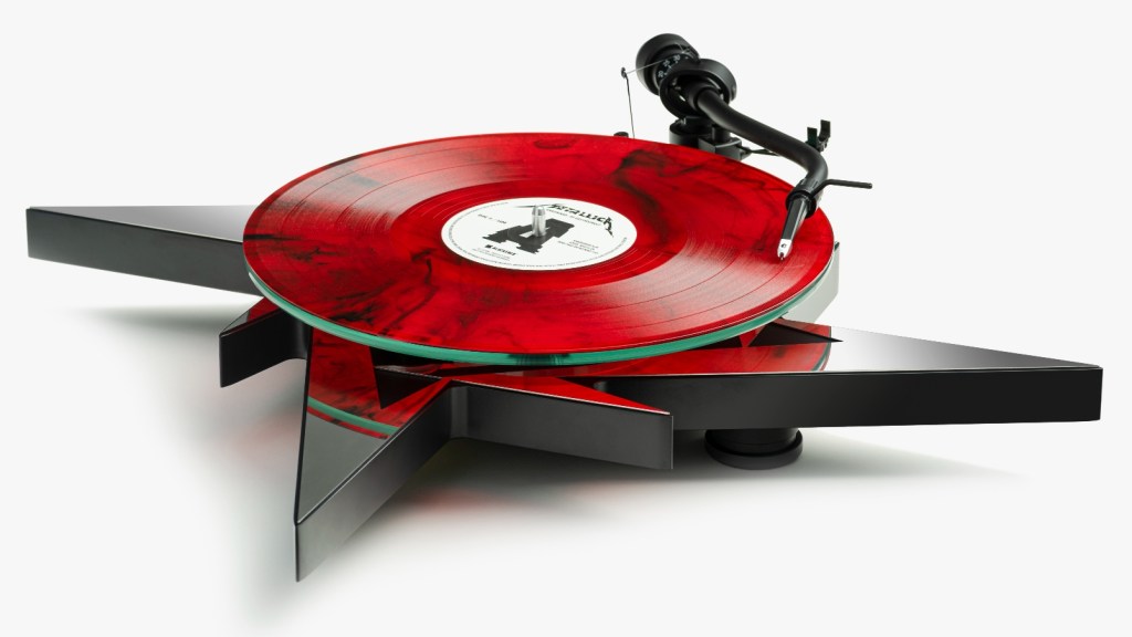 The Pro-Ject Metallica turntable spins a bright red vinyl record
