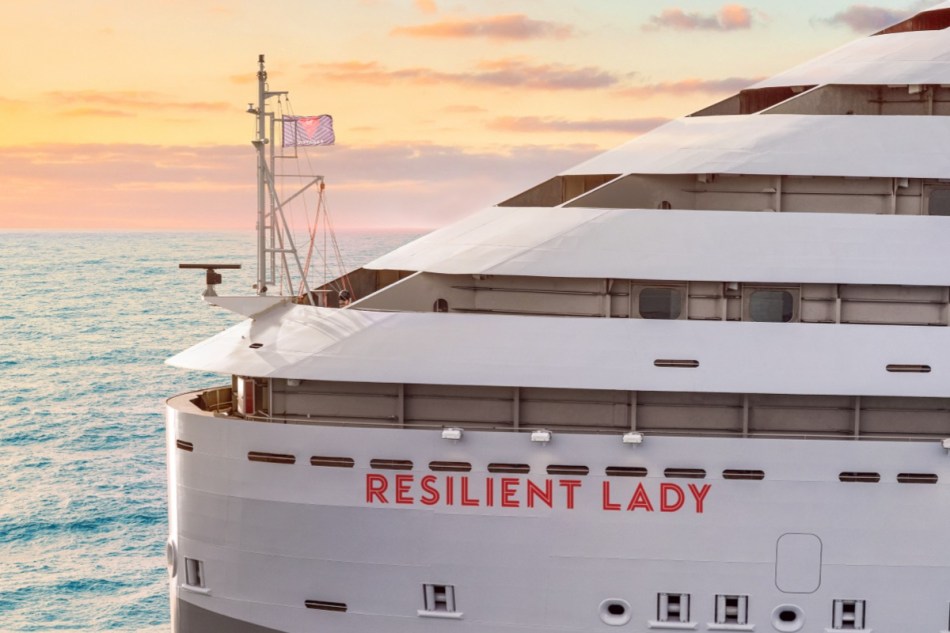 Virgin Voyages Resilient Lady at sea as the sun sets