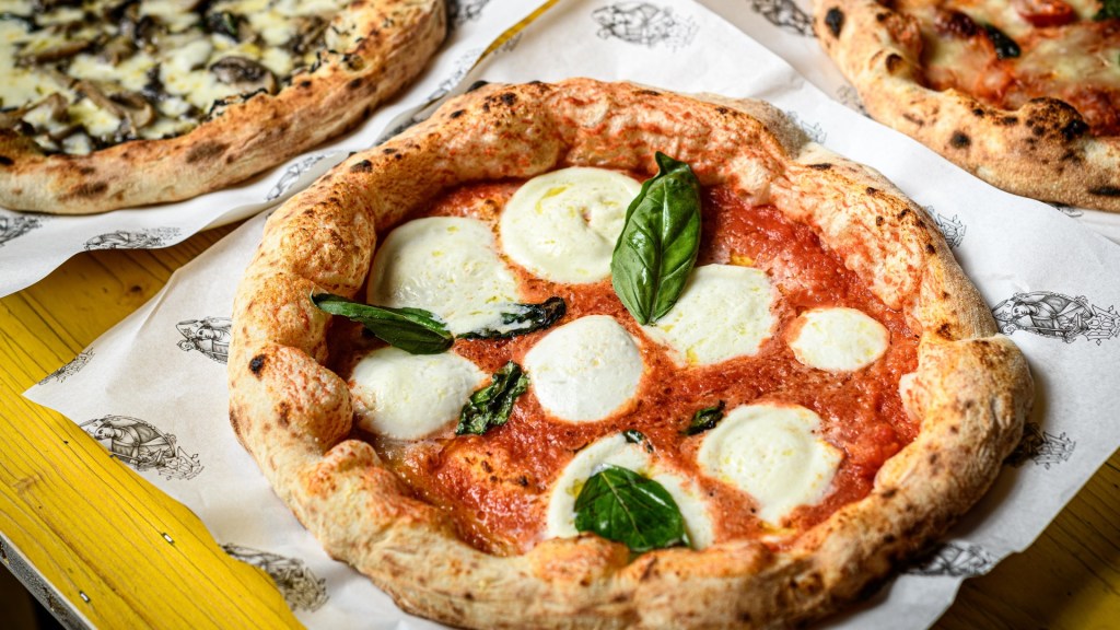 A tray of mouth-watering pizzas from 081 Neapolitan Pizza