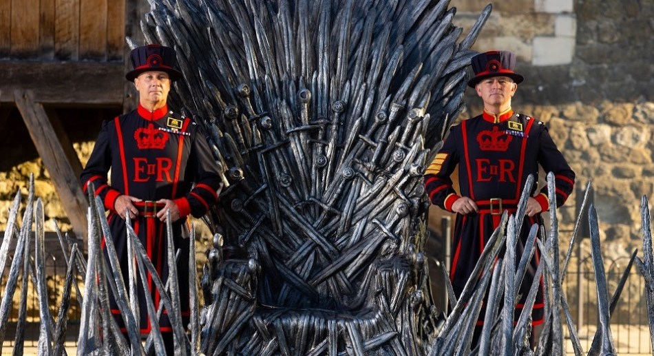 Beefeaters flank the Iron Throne at The Tower of London