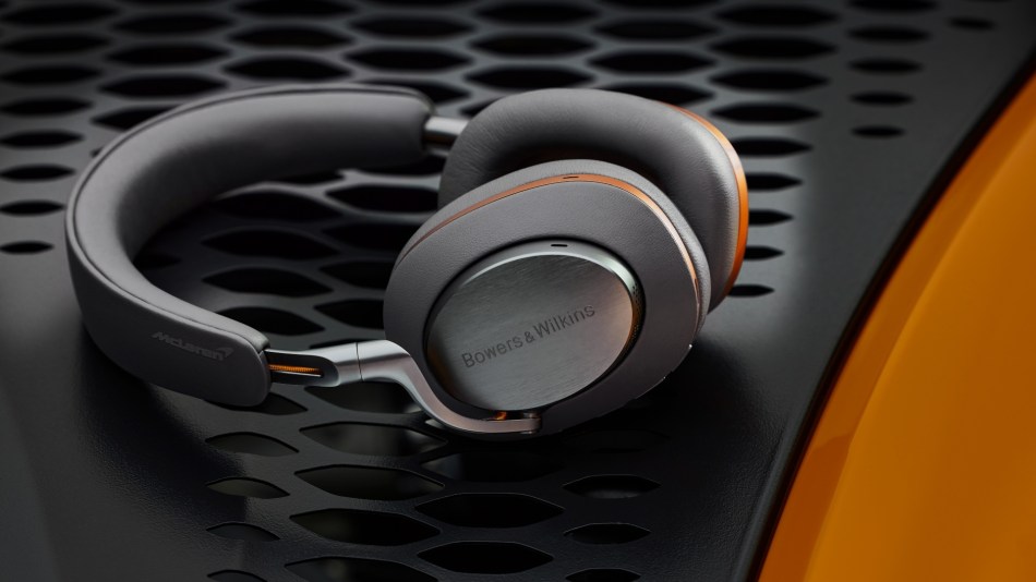 The Px8 McLaren Edition headphones on a supercar