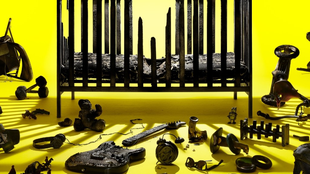 A child's cot surrounded by broken guitars and headphones