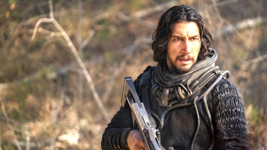 Adam Drivers wields a space rifle in 65 movie