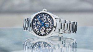 Orient Star Contemporary Full Skeleton premium watch on a reflective surface