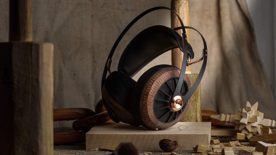 Meze 109 Primal Pro headphones on woodblock