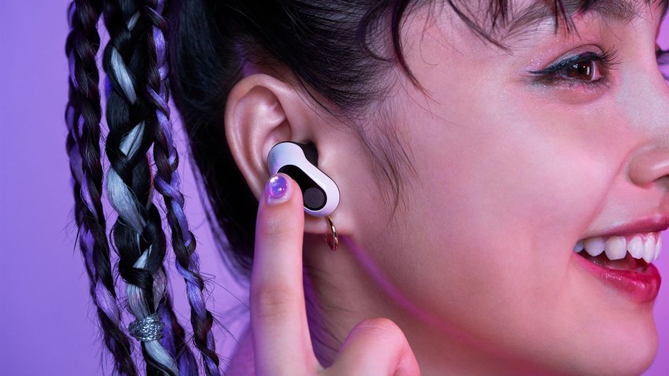 Sony Inzone gaming buds in the ear of a young gamer