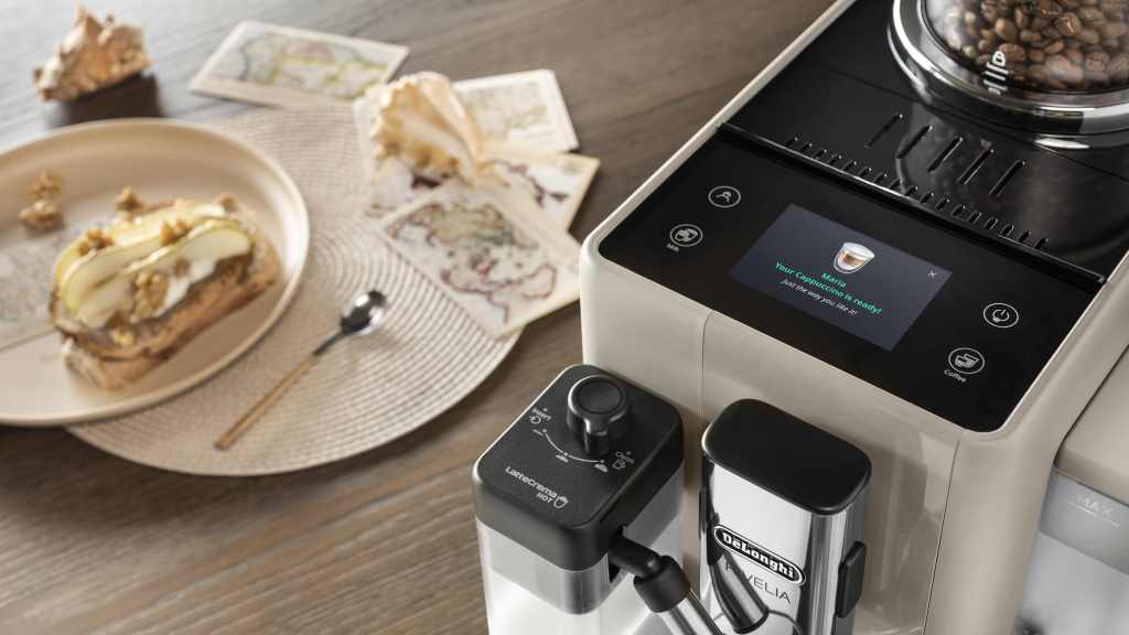 De'Longhi Rivelia coffee machine on a breakfast table