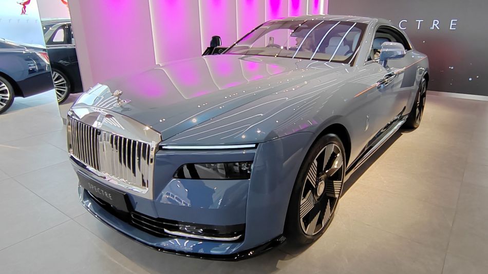 Rolls-Royce Spectre in a showroom setting