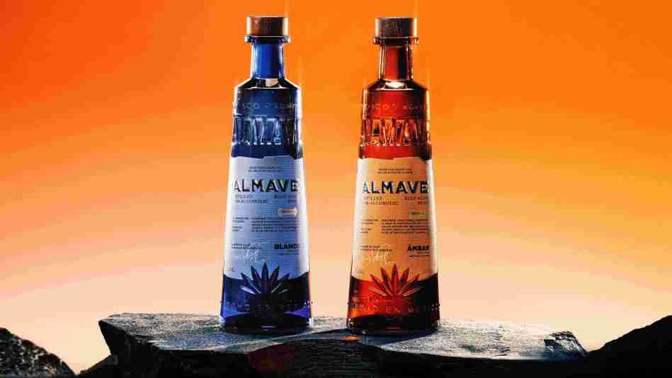 Lewis Hamilton Ambar Blanco spirit bottles on rock