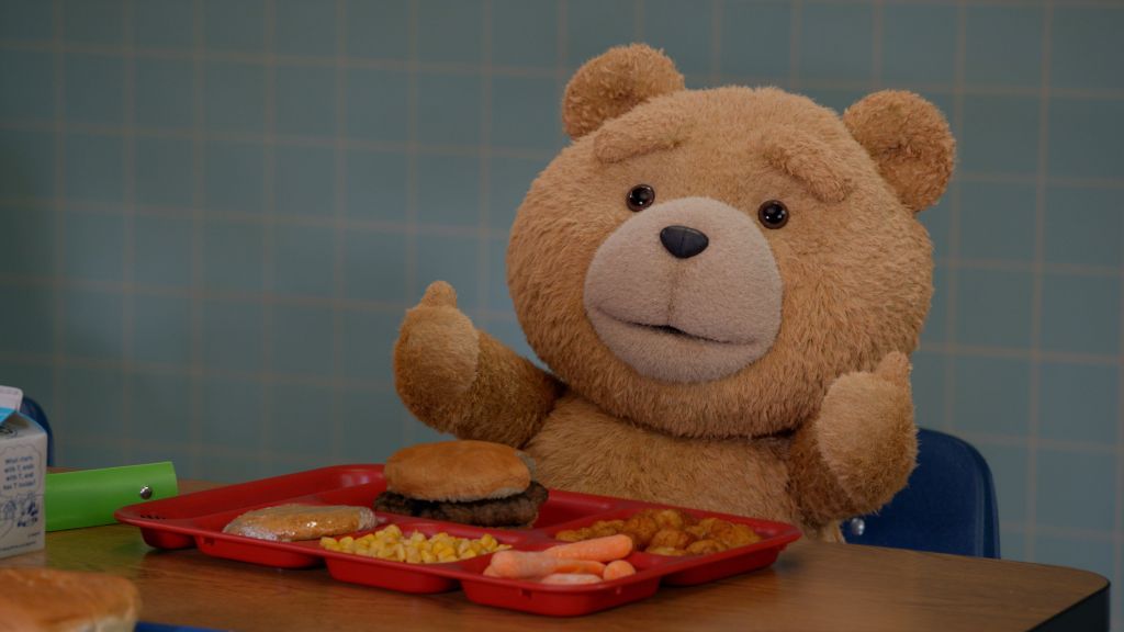 Ted the foul-mouthed bear has lunch