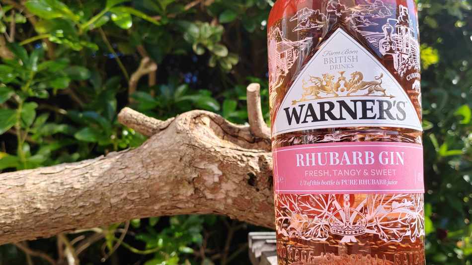 Warner's Distillery Rhubarb Gin surrounded by greenery