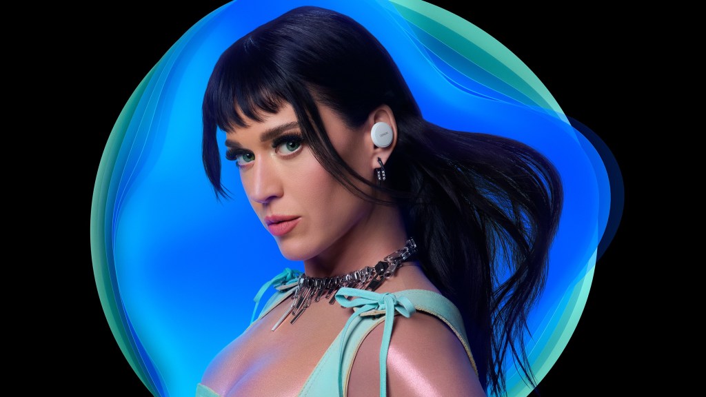 Katy Perry wears a pair of Denon PerL earbuds