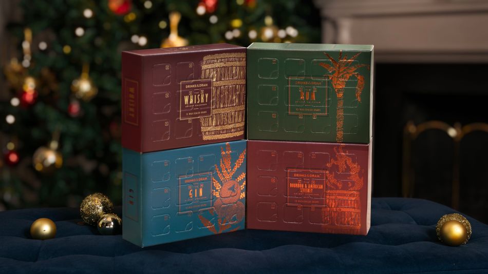 Whisky run gin Advent Calendars in front of a Christmas tree