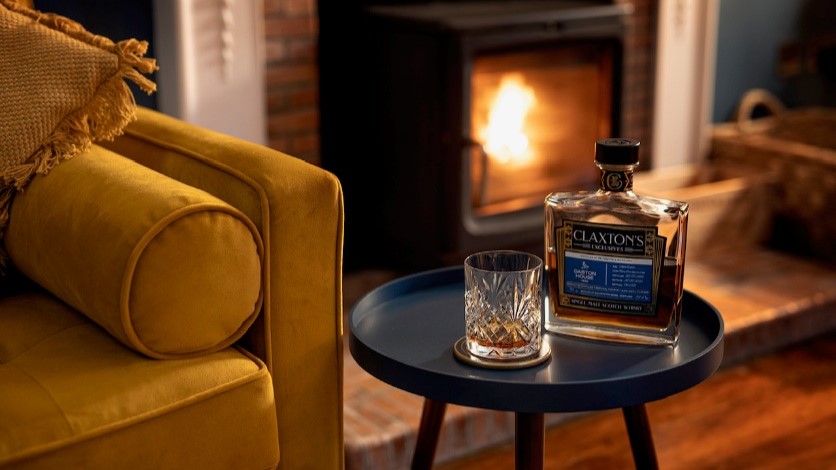 Dabton House whisky by fireside