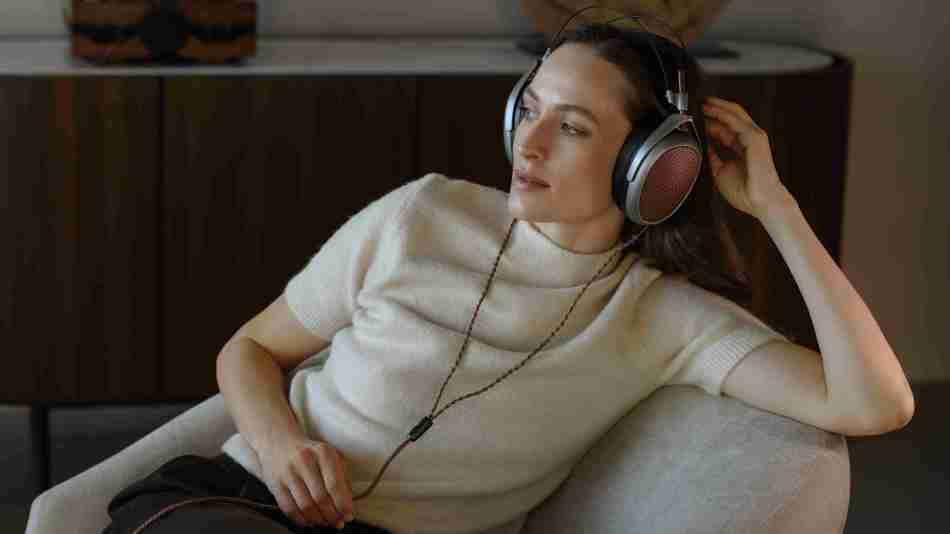 Meze Audio POET headphones on a female model