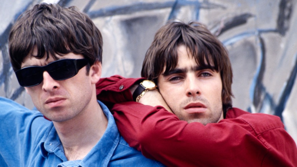 Noel and Liam Gallagher of British rock band Oasis on Portland St, Manchester, 2 August 1994