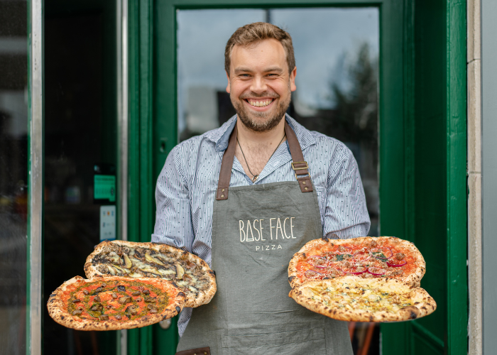 base Face pizza founder Tim Thornton with pizzas