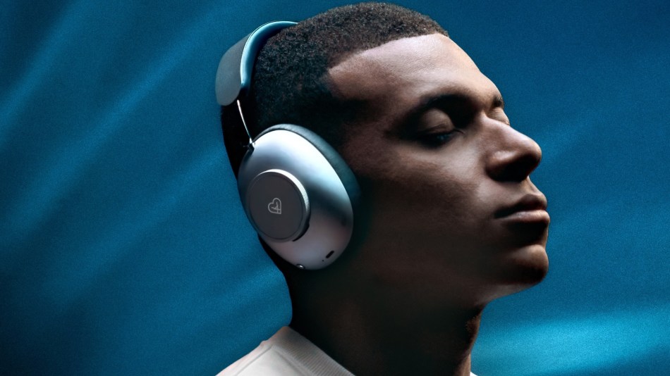 Kylian Mbappé wearing Loewe Leo headphones