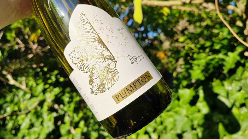 Plumpton Bacchus Reserve wine in hand