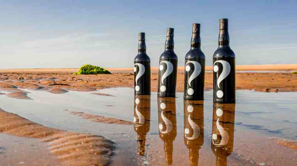 Mystery Malt series 6 whiskies on a beach
