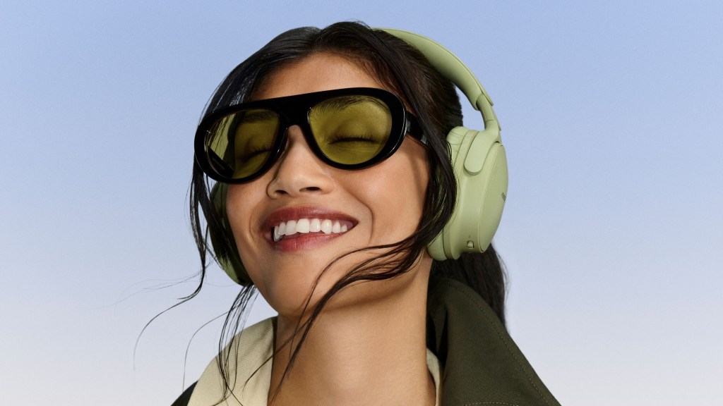 Bose QuietComfort Headphones (2nd Gen)_Eucalyptus Green worn on head