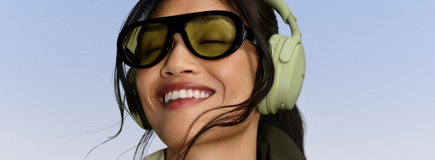 Bose QuietComfort Headphones (2nd Gen)_Eucalyptus Green worn on head