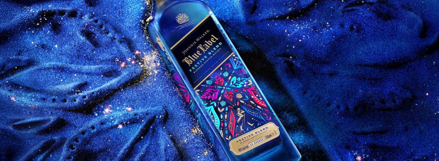 Johnnie Walker Festive Blend bottle on satin