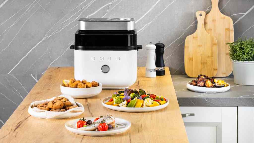 SMEG Air Fryer and plates of food
