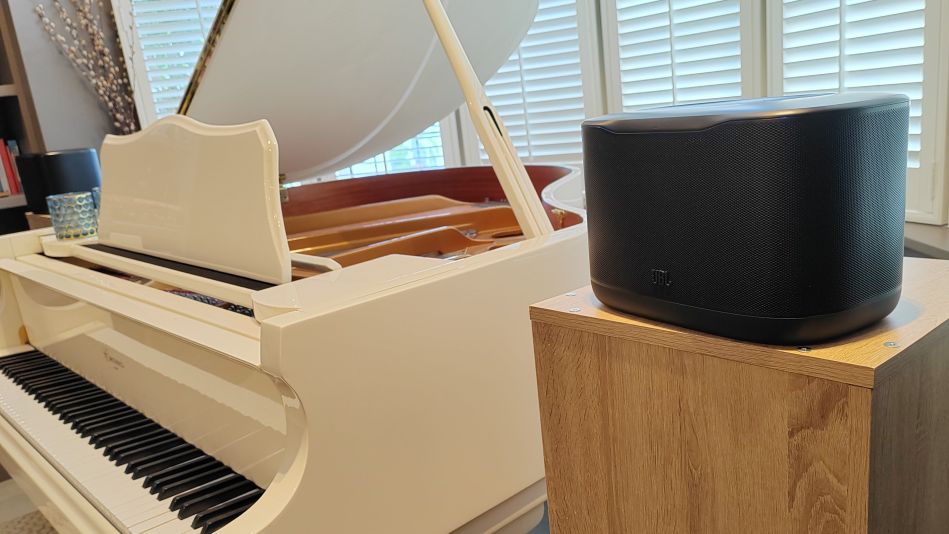 JBL Cove X1 near a grand piano