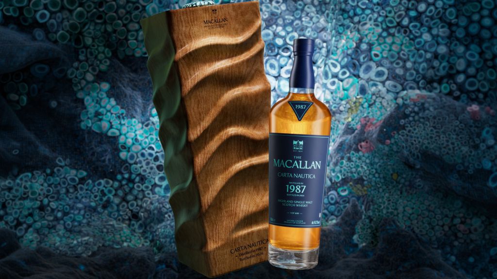 A bottle of The Macallan 1987 whisky displayed next to a uniquely designed wooden box, set against a vibrant, abstract background.