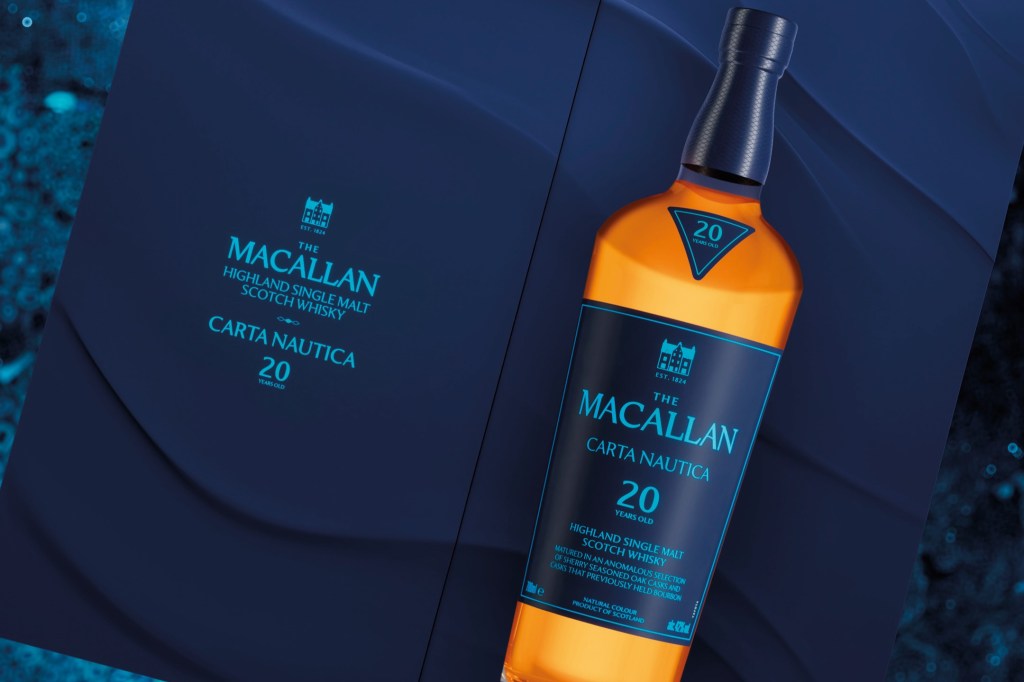 A bottle of The Macallan 20 Year Old Highland Single Malt Scotch Whisky, featuring a turquoise label with 'Carta Nautica' text and presented against a dark background.